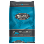 A bag of Muenster Ancient Grains Recipe dog food with ocean fish, featuring a blue and gray design with illustrations of grains.