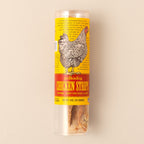 Polkadog Chicken Strip Jerky dog treats packaging on a beige background