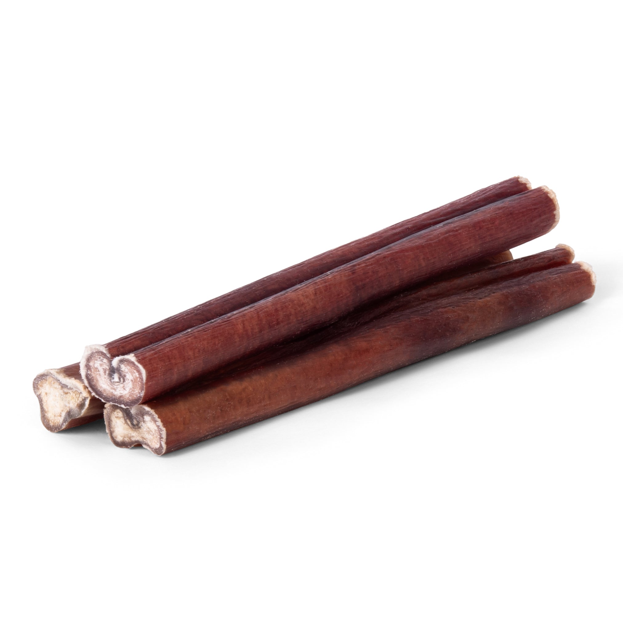 Angled view of three 6-inch bully sticks showing baked brown exterior and meaty cross-sections on a white background