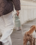 3-in-1 Dog Travel Water Bottle with 32 oz Reservoir and Two Detachable Bowls in Three Colors source image 4