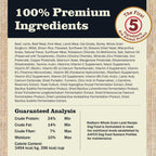 Back label panel for a dog food product showing a 100% premium ingredients claim, a circular badge reading 'The First 5 Ingredients Are Animal Protein,' a list of included ingredients, nutritional guarantees, and Redband Whole Grain Land Dog Food branding at the bottom.