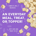 Weruva Paw Lickin' Chicken Freeze Dried cat food cubes on a purple background. “An everyday meal, treat, or topper! Complete and balanced. Bite sized and ready to eat.” Ideal for those wanting quality chicken breast cat food.