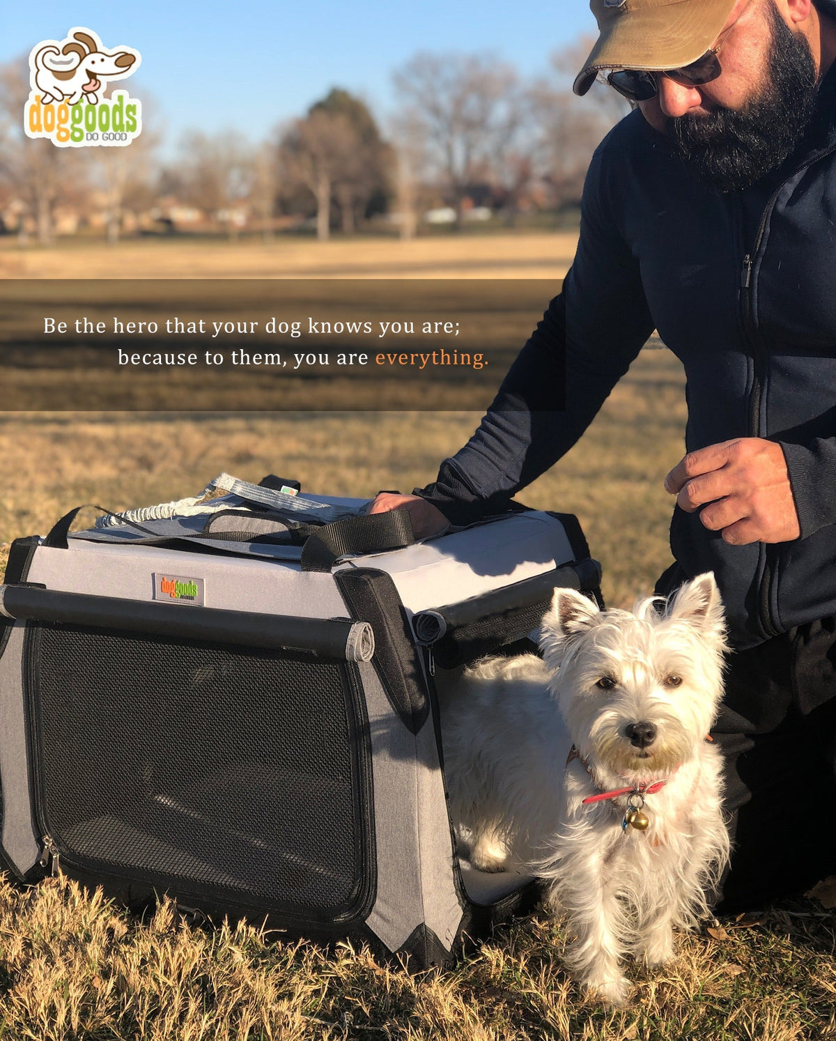 Man outdoors with his dog next to a DogGoods foldable crate. The dog stands attentively, wearing a red collar, with a heartfelt message about being a hero to your pet.