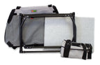 Disassembled DogGoods foldable crate with a sturdy metal frame, soft fleece mat, and compact carrying case for easy transport and storage.
