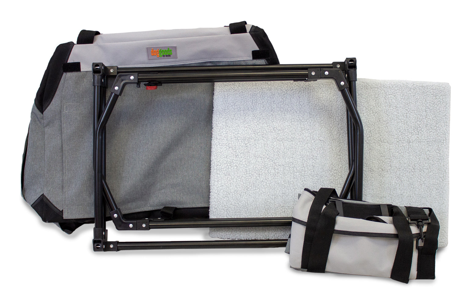 Disassembled DogGoods foldable crate with a sturdy metal frame, soft fleece mat, and compact carrying case for easy transport and storage.