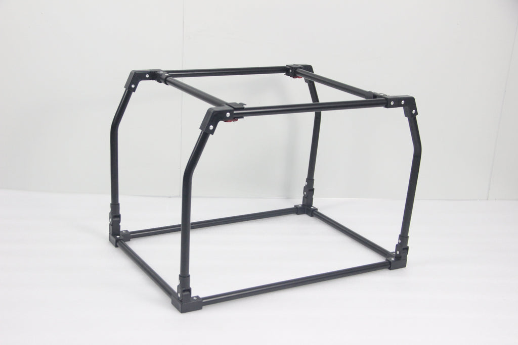 Sturdy black metal frame of the DogGoods foldable crate, designed for durability and easy assembly with a slide-and-click mechanism.
