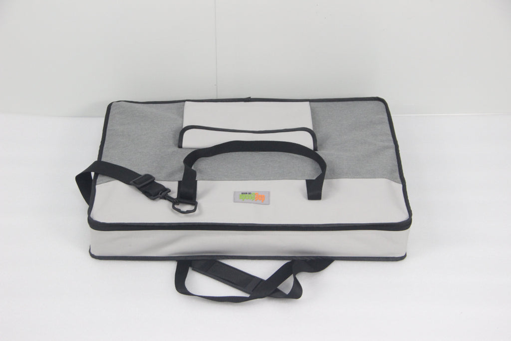 Compact and lightweight carrying case for the DogGoods foldable crate. Features sturdy handles and an adjustable shoulder strap for easy transport.