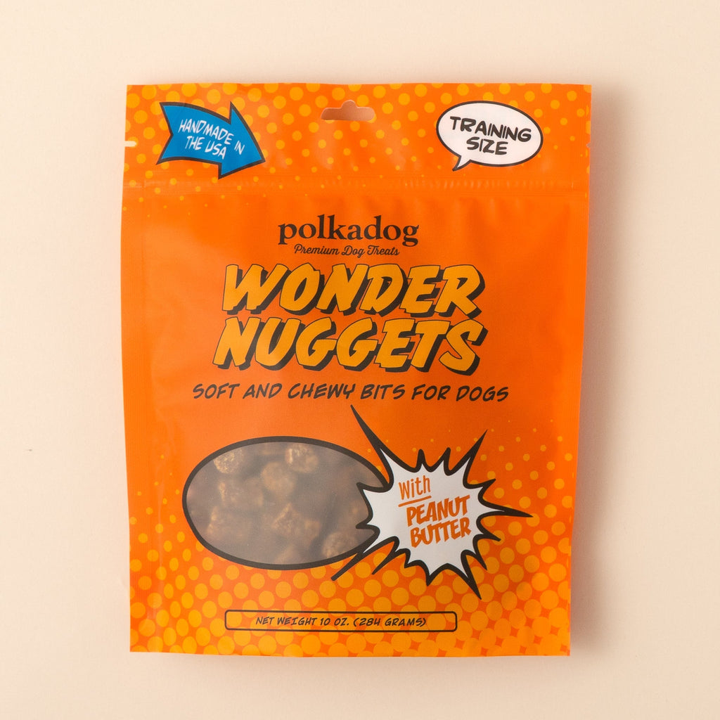 Polkadog Wonder Nuggets Peanut Butter dog treats pouch packaging on a beige background