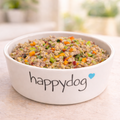 Fresh homemade dog food prepared using Happy Dog Food whole grain base mix