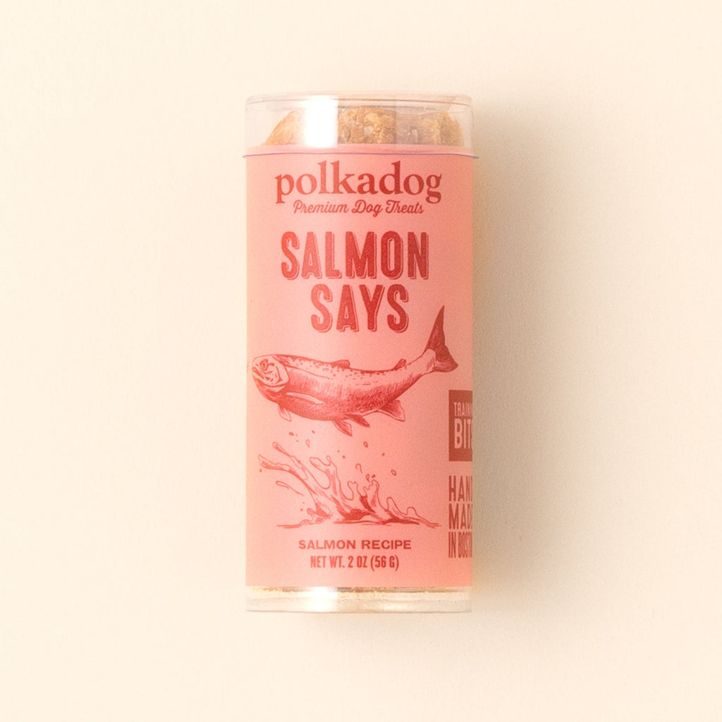Polkadog Salmon Says Training Bits 2oz mini tube on a beige background