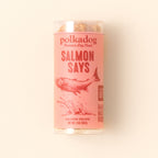 Polkadog Salmon Says Training Bits 2oz mini tube on a beige background
