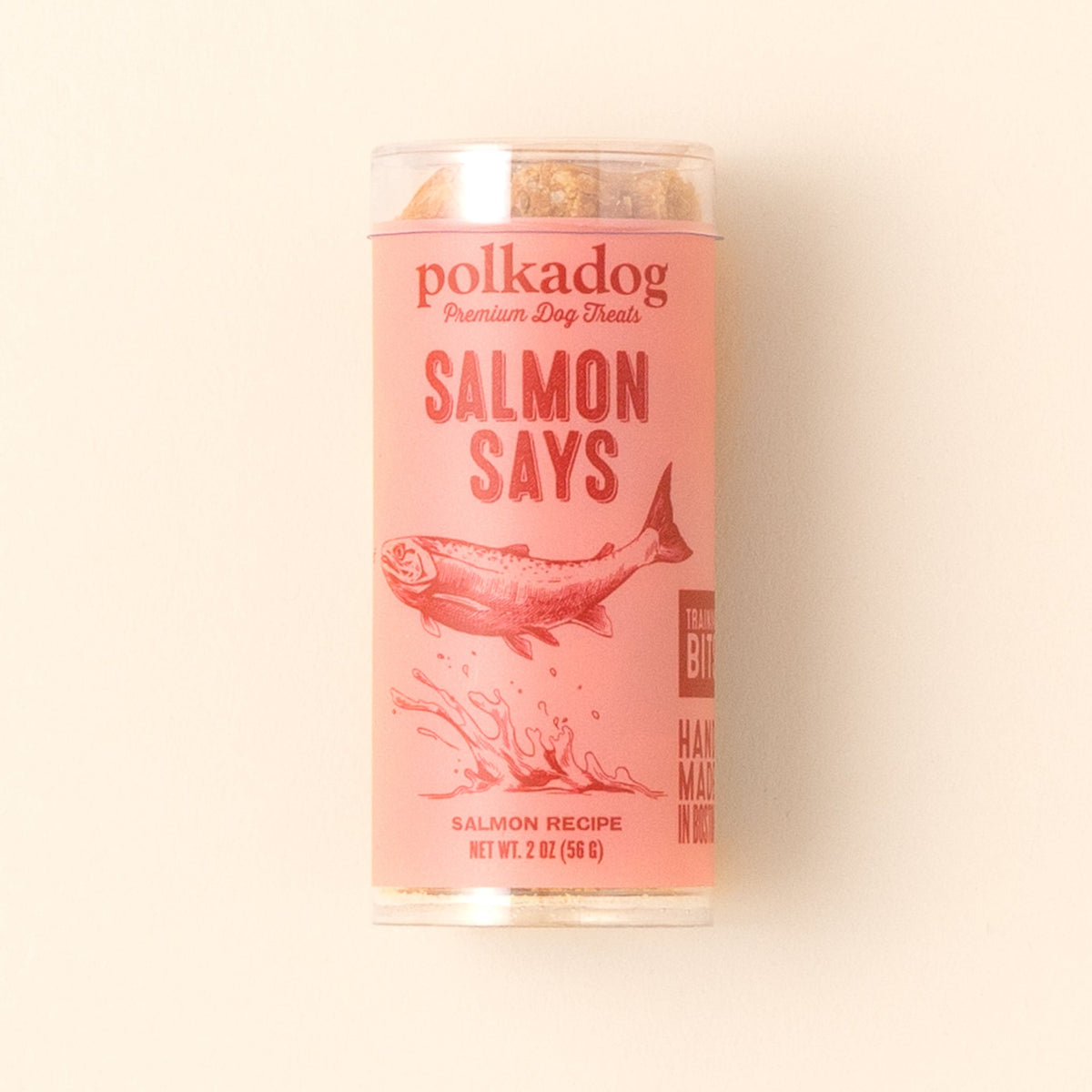 Polkadog Salmon Says Training Bits 2oz mini tube on a beige background