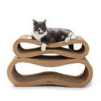 Scratchers stacked with cat chilling on top