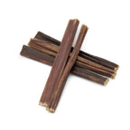 Four Best Bully Sticks 6-Inch Gullet Sticks, arranged in a crisscross pattern on a white background, make delicious dog treats that support joint health.