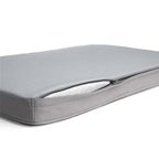 A grey (light grey) Diggs snooz pad with an open zipper.