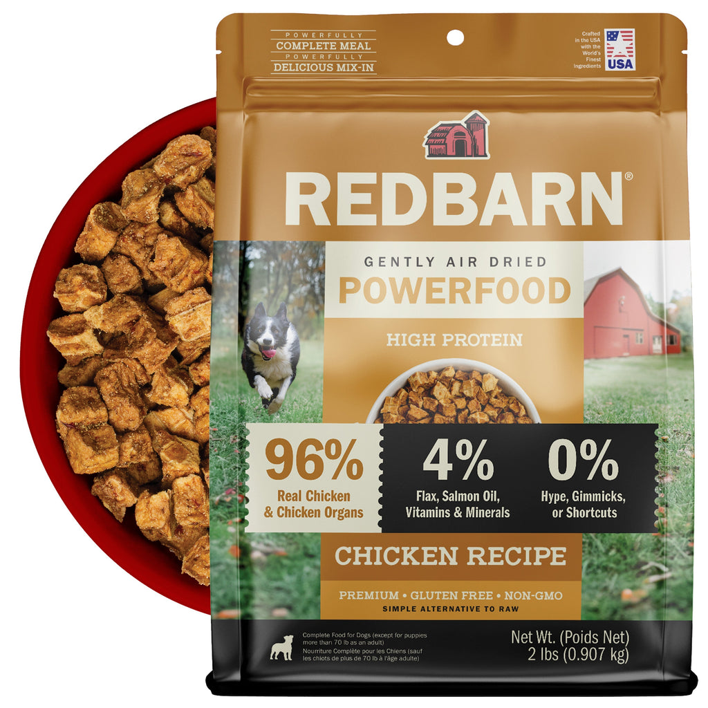Best Air Dried Dog Food. Redbarn Powerfood High Protein Chicken Recipe dog food package with a bowl full of food in the background.