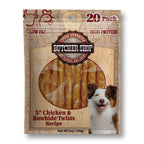 A 20-pack bag of Butcher Shop Natural Dog Chow 5-inch chicken and rawhide twists recipe dog treats. The packaging features a wood-grain pattern background, a circular clear window showing the golden-brown twisted treats inside, and a smiling brown and white dog on the lower right.