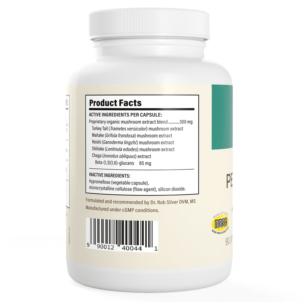 The Real Mushrooms Pet Defenders™ Organic Mushroom Blend Capsules for Pets bottle displays the product facts label with active and inactive ingredients, including beta-glucan-rich organic mushroom extracts for pet immune support. Barcode and certifications are shown.