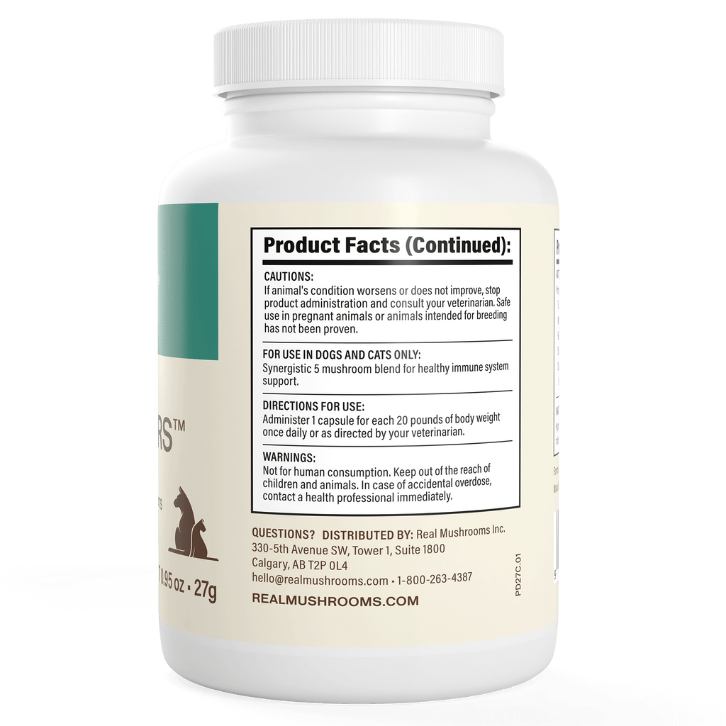 White Real Mushrooms supplement bottle with a label showing product facts, cautions, directions, and distributor details for Pet Defenders™ Organic Mushroom Blend Capsules for Pets, featuring organic mushroom extracts for immune support.