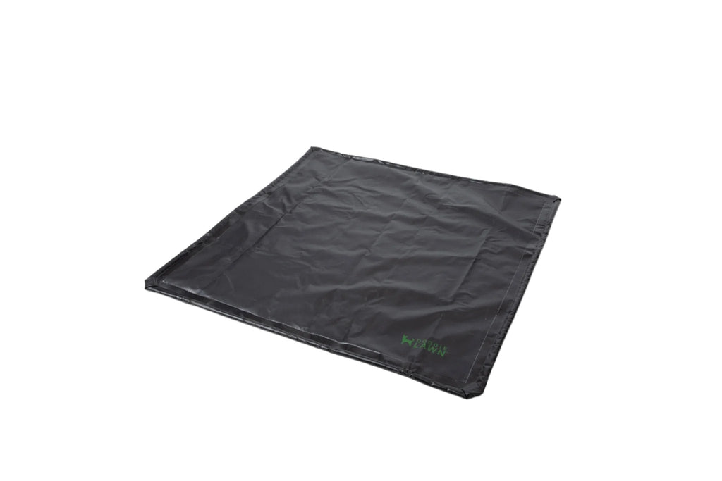 DoggieLawn double-size flexible black tray mat for grass pads, shown folded flat on a white background.