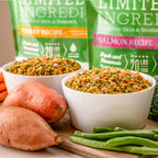 Two bowls of Limited Ingredient Sensitive Skin & Stomach Turkey and Salmon Recipe dog food with sweet potatoes, carrots, and green beans.