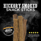 Four hickory smoked snack sticks from Best Bully Sticks’ Hickory Smoked Sampler Box stand upright against a smoky black background, with bold text and a five-star review—ideal for fans of Bully Sticks and smoked dog chews.