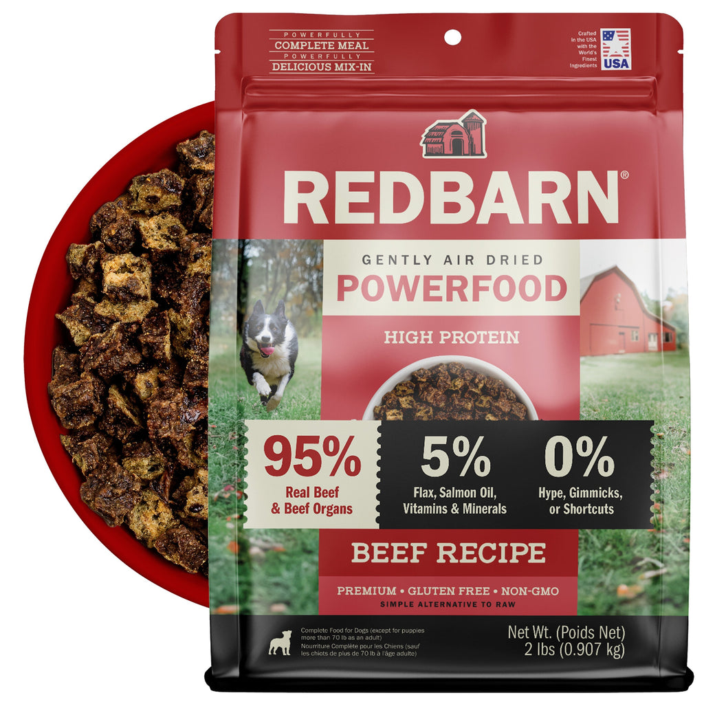 Best Air Dried Food. Redbarn Powerfood High Protein Beef Recipe dog food package with a bowl full of food in the background.