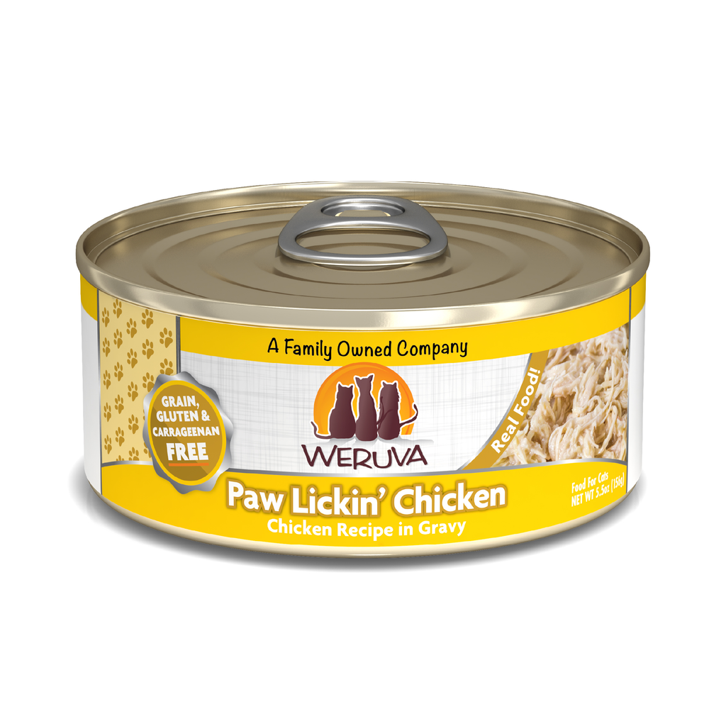A can of Weruva Paw Lickin' Chicken cat food features boneless white meat chicken in gravy, is grain, gluten, and carrageenan free, and has a yellow and white design with shredded chicken on the label.