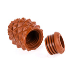 The Conifur, a brown pinecone-shaped container with a textured surface and a removable screw-on lid, is shown next to its open container.
