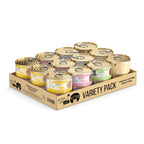 A cardboard tray labeled Variety Pack holds twelve cans of Cats in the Kitchen Weruva's Kitchen For Kittens, featuring boneless, skinless cuts and assorted flavors with colorful labels to support kitten health.