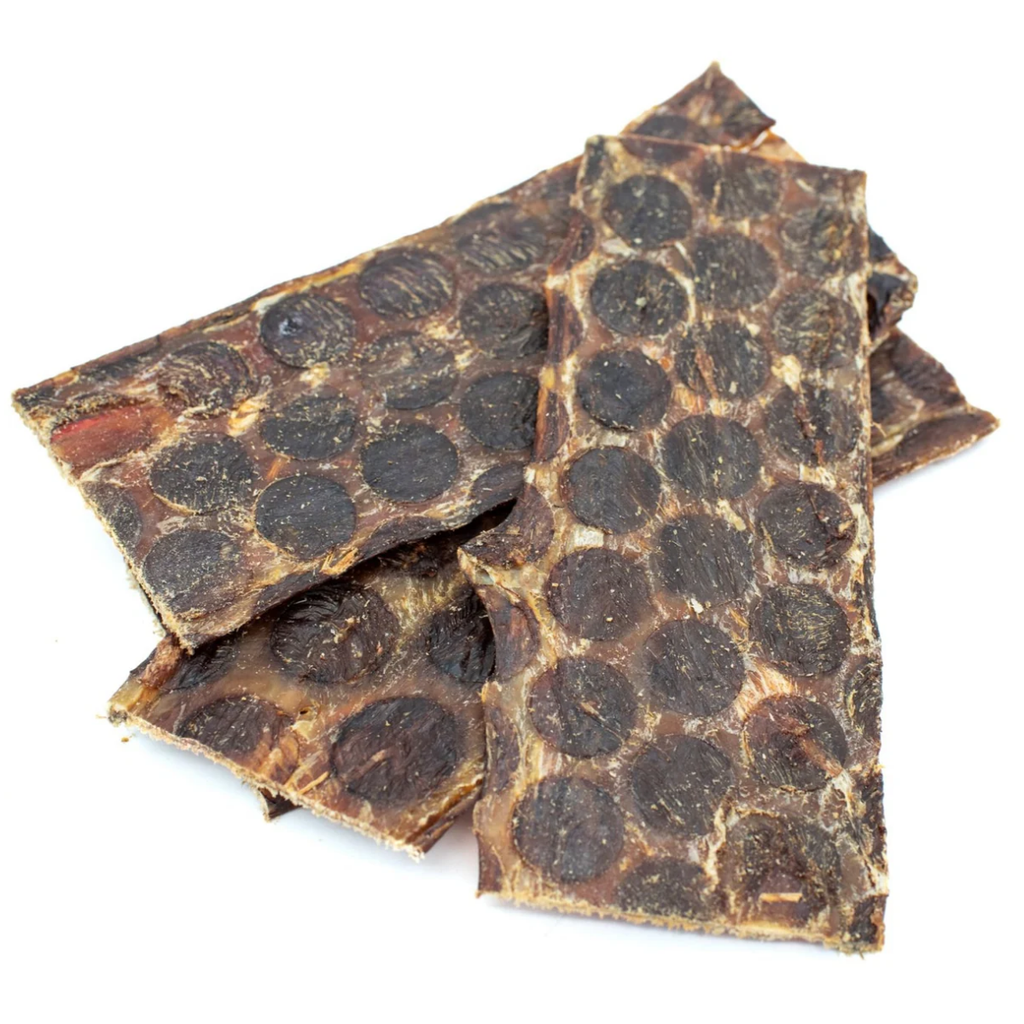 Three 6-inch beef jerky strip dog treats from Bully Bunches.
