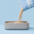 FURRLY Kind Natural Cat Litter in a bag, showing the eco-friendly packaging and product details.