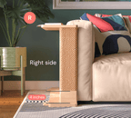 A Cat-e-Corner table placed next to a sofa, integrating a cat's scratching post with a small table, in a room with a plant and a colorful cushion.