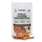 Front view of Philly Chicken Cheesesteak pouch showcasing dehydrated chicken breast and cheese jerky through clear window on white background