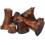 Front view of smoked marrow bones showcasing smoked, meaty marrow cross-sections with white background