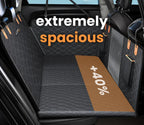 RuffRover 2.0 hard bottom dog car seat protector in a spacious black quilted design with a brown accent area.