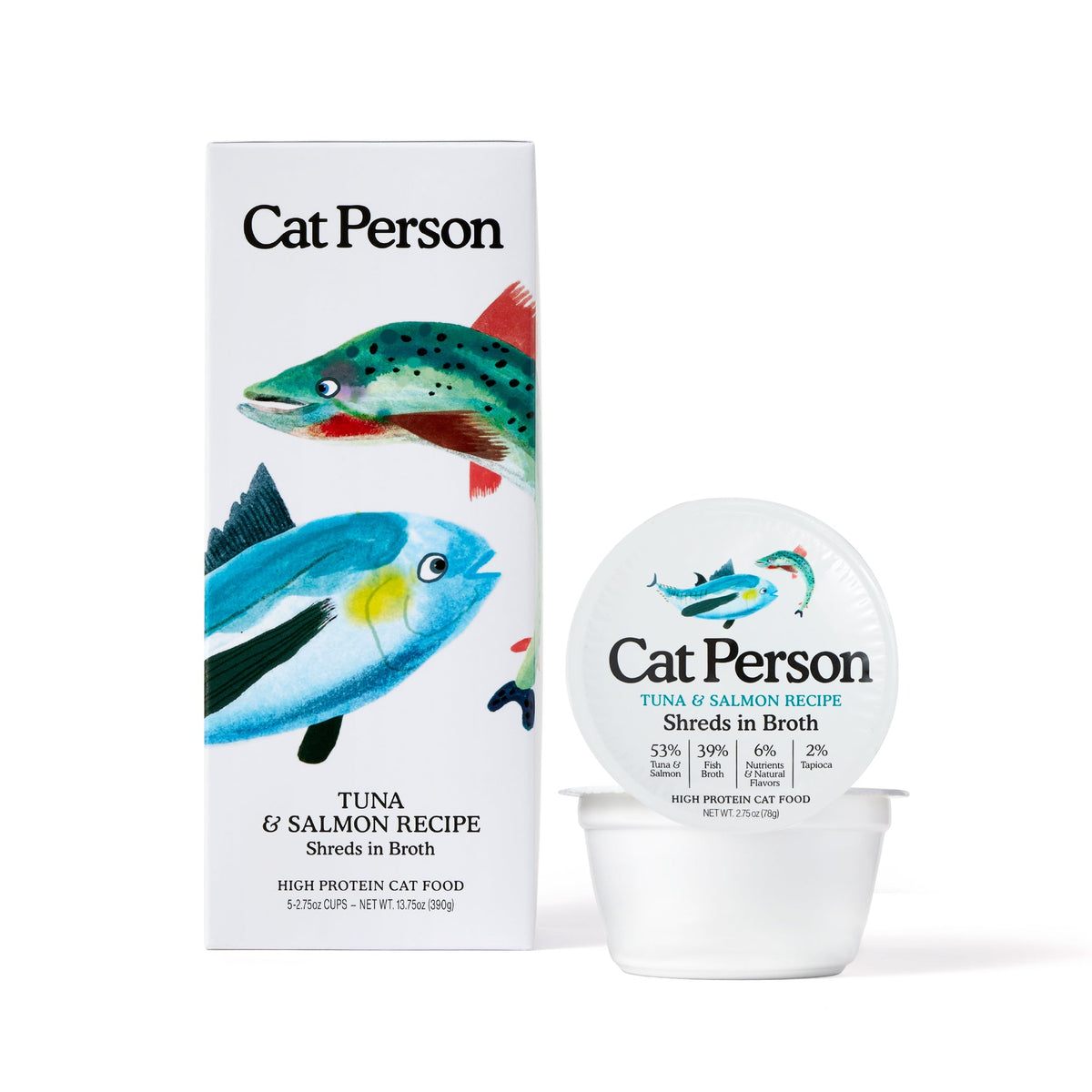 A box and cup of Cat Person Tuna & Salmon Shreds in Broth cat food are shown with illustrated fish and product info on the packaging, both displayed against a white background.
