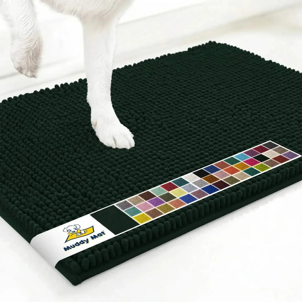 Top view of Muddy Mat anti-mud dog door mat in hunter green showcasing dense chenille tufts and non slip backing with white floor background