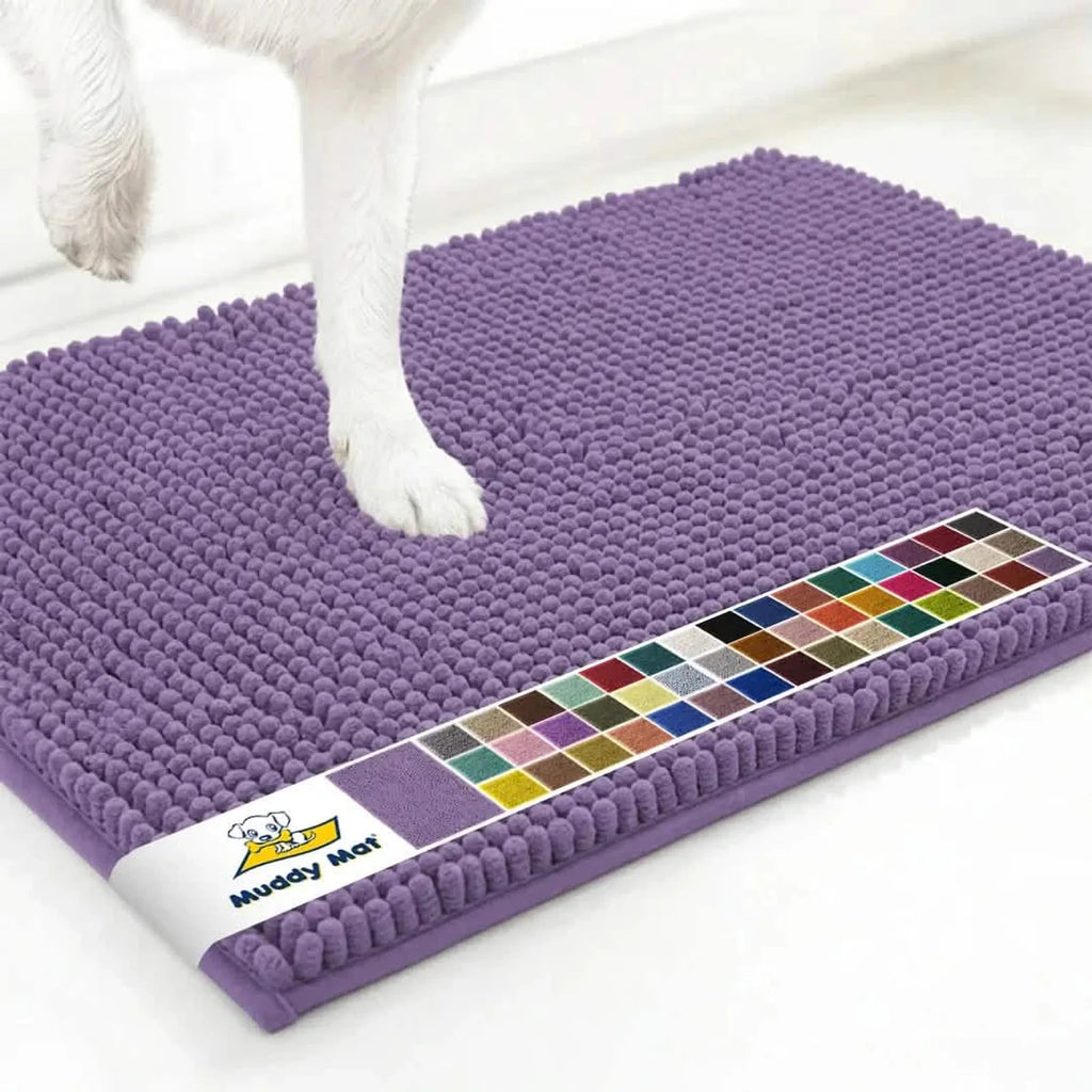 Angled view of Muddy Mat anti-mud dog door mat in lavender showing chenille surface and a dog’s paw on a white floor