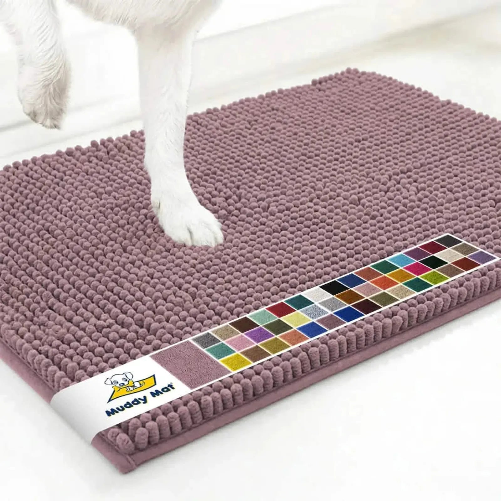 Angled top view of plum Muddy Mat® anti-mud dog door mat showing dense chenille microfiber surface and a dog paw on a white floor