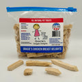 Packaged dog treats with a label on a white background.. Gracie's Doggie Delights Chicken Breast