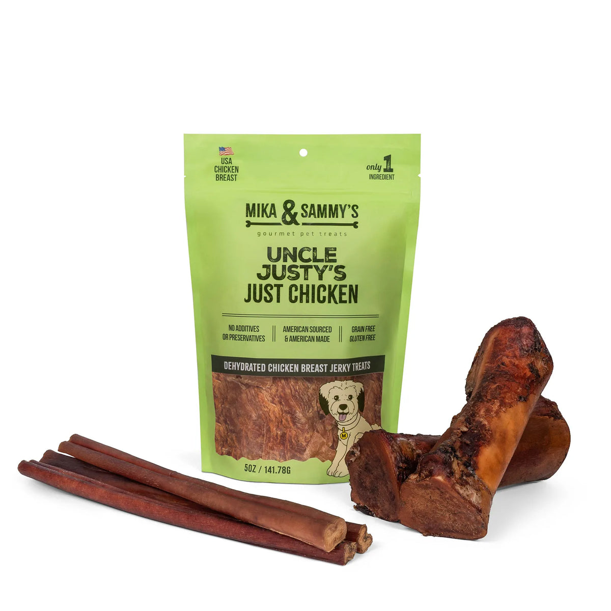 Front of Large Dog Spring Treat Bundle: Uncle Justy’s 5 oz chicken jerky, two marrow bones and three bully sticks on white