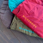 Water resistant dog camping sleeping bag with stuff sack