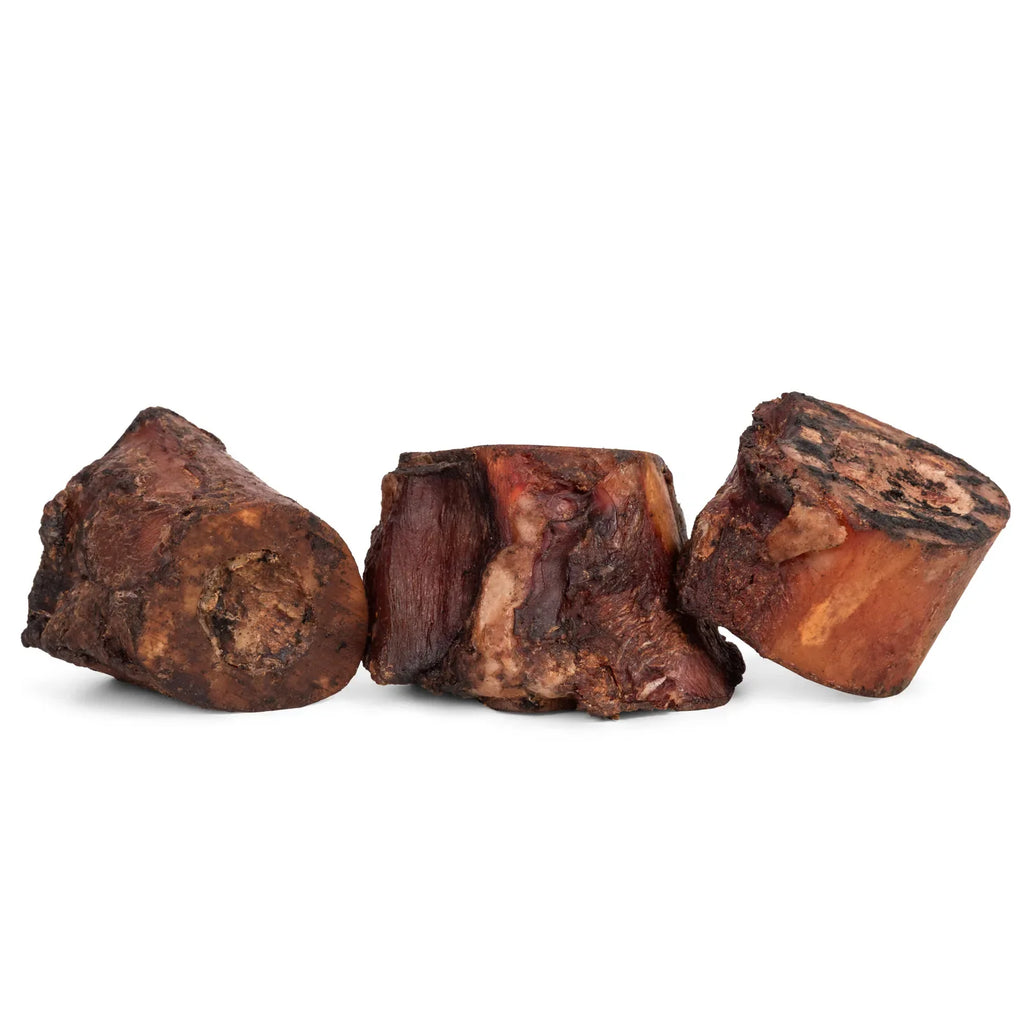 Three smoked beef marrow bones side by side